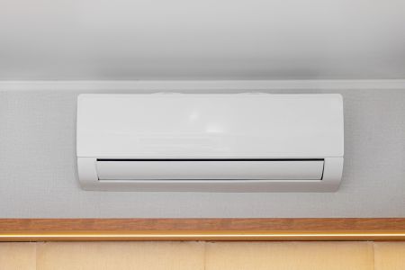 How can mini ductless systems improve comfort in hard to cool rooms